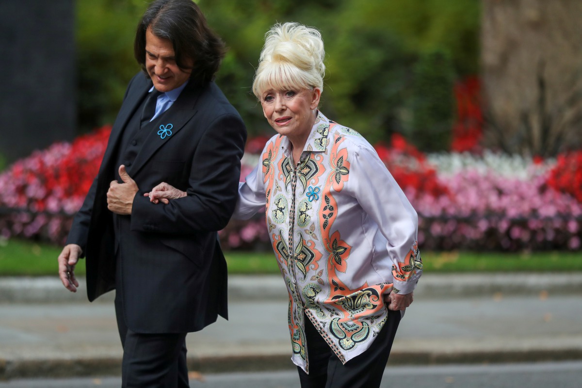 FILE PHOTO: Television actor Barbara Windsor and her husband Scott Mitchell arrive for a meeting with Britain's Prime Minister Boris Johnson in London, Britain, September 2, 2019. REUTERS/Simon Dawson/File Photo
