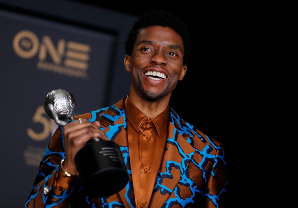 50th NAACP Image Awards - Photo Room - Los Angeles, California, U.S., March 30, 2019 - Chadwick Boseman poses backstage with his Outstanding Actor in a Motion Picture award for Black Panther. REUTERS/Mike Blake/File Photo