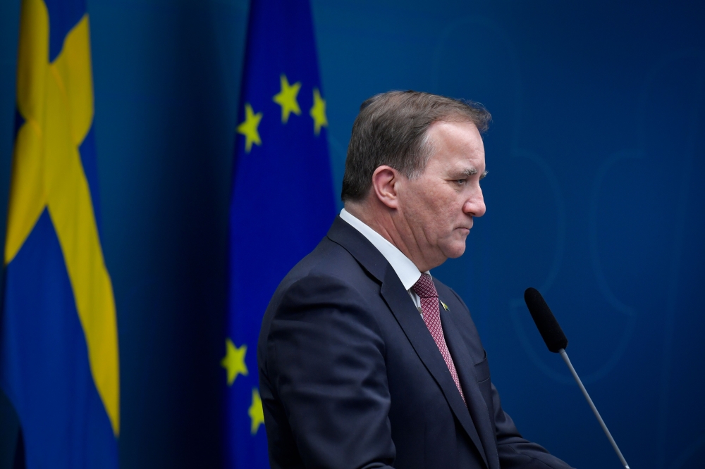 Prime Minister Stefan Lofven speaks during a press conference on the new restrictions during the coronavirus Covid-19 pandemic, in Stockholm on December 18, 2020. AFP / TT News Agency / Jessica GOW