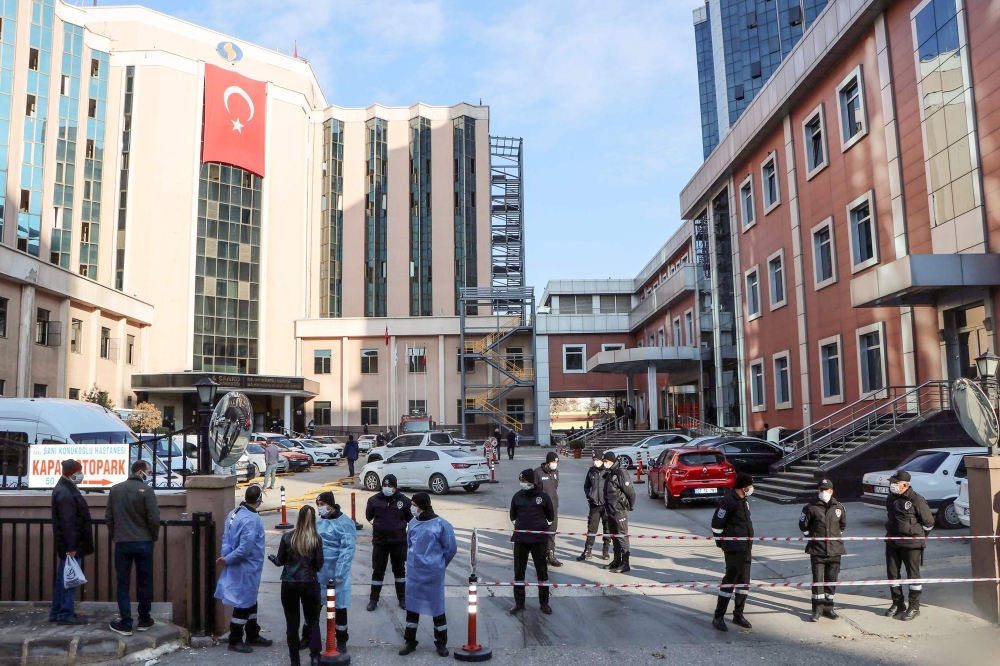 Police cordon off the area in front of the privately-run Sanko University Hospital in Gaziantep after nine patients, all infected with Covid-19, died in a fire on December 19, 2020. AFP /Kadir Gunes AND Kadir Gunes