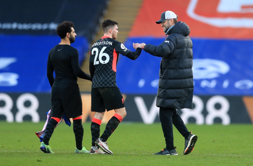 Liverpool manager Juergen Klopp and Liverpool's Andrew Robertson celebrate after the match. REUTERS/Adam Davy
