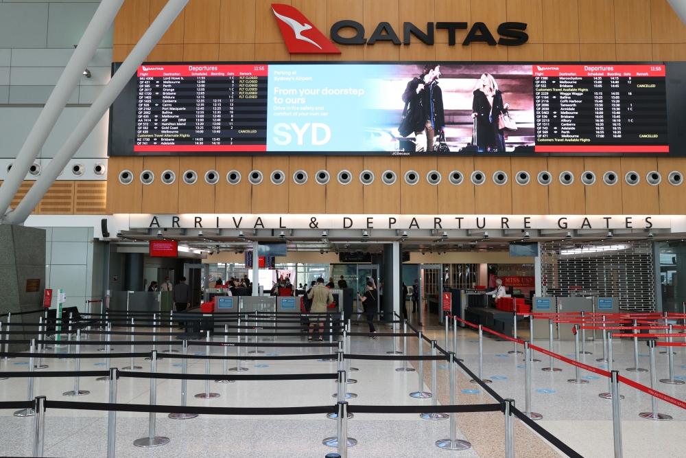 A mostly empty domestic terminal at Sydney Airport is seen after surrounding states shut their borders to New South Wales in response to an outbreak of the coronavirus disease (COVID-19) in Sydney, Australia, December 21, 2020. Reuters/Loren Elliott