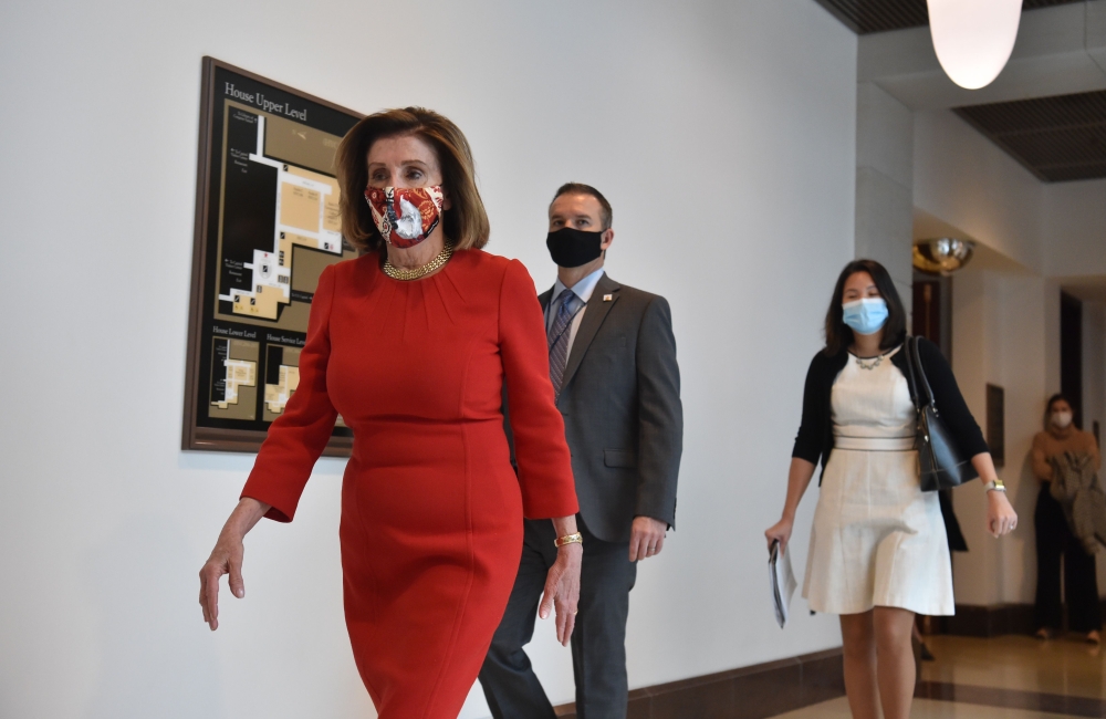 In this file photo taken on December 4, 2020, US Speaker of the House Nancy Pelosi, Democrat of California, leaves after speaking during her weekly press briefing at Capitol Hill, in Washington, DC. AFP / Nicholas Kamm