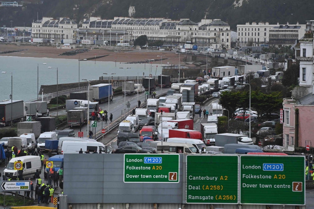 Traffic queues trying to enter the port of Dover in Kent, south east England, on December 23, 2020, that is still cordoned after the UK and France agreed a protocol to reopen the border to accompanied freight arriving in France from the UK requiring all l