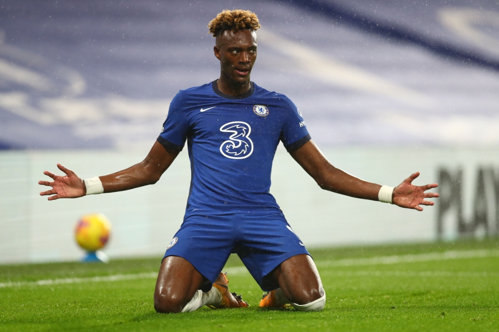 Chelsea's English striker Tammy Abraham celebrates after scoring a goal. (AFP / Clive Rose)