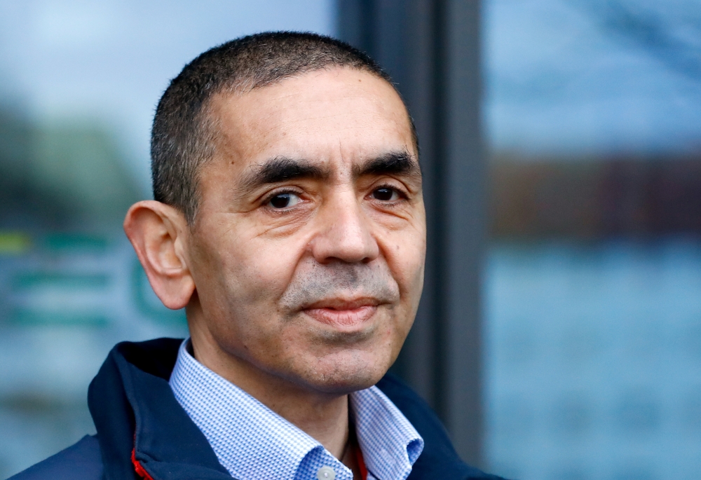 CEO and co-founder of BioNTech, Ugur Sahin, answers journalists' questions after the European Medicines Agency (EMA) approved its COVID-19 vaccine, at the company headquarters in Mainz, Germany December 22, 2020. REUTERS/Ralph Orlowski