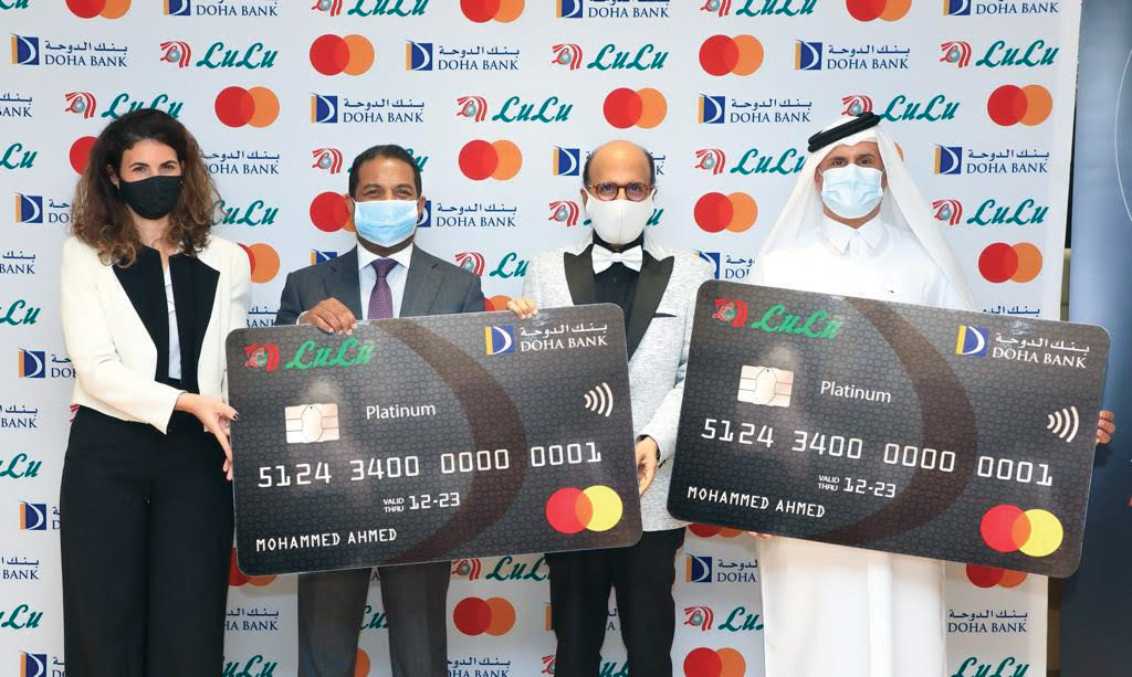 Dr. R Seetharaman, Dr. Mohamed Althaf and other officials during the launch of new card.