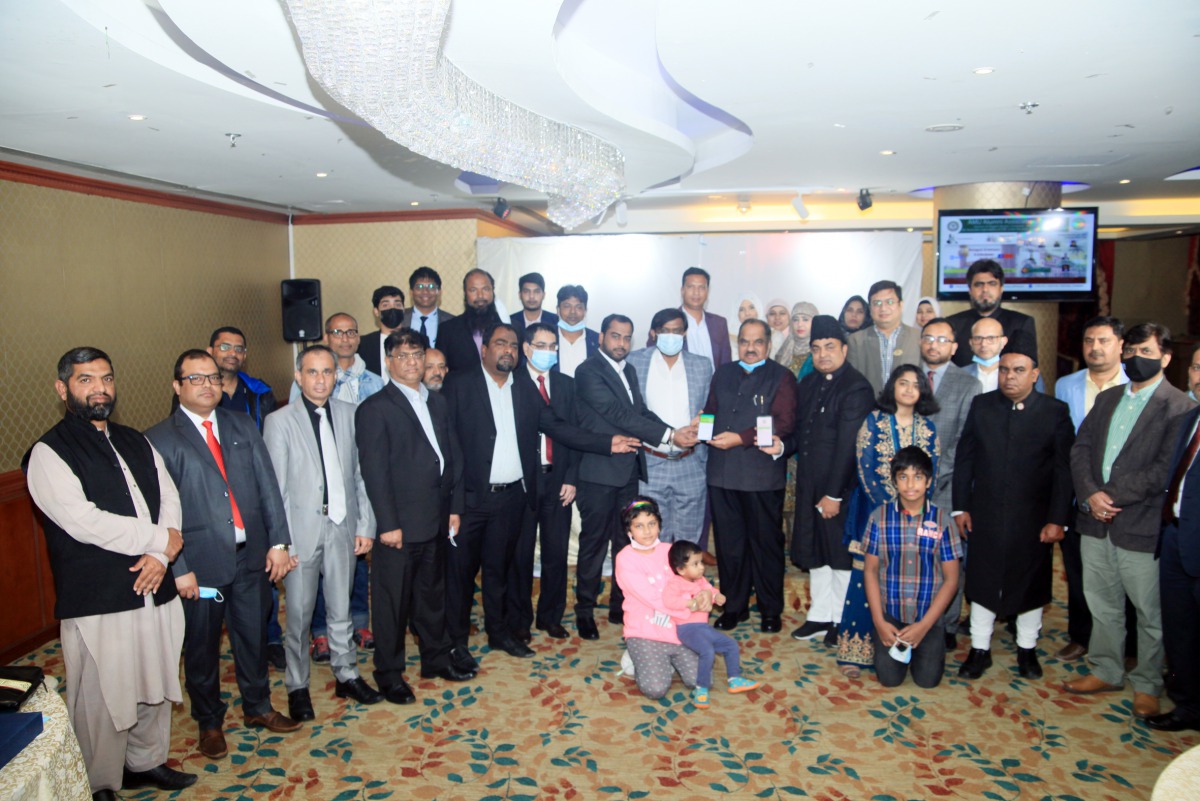 AMUAAQ members celebrating 100 years of Aligarh Muslim University (AMU).