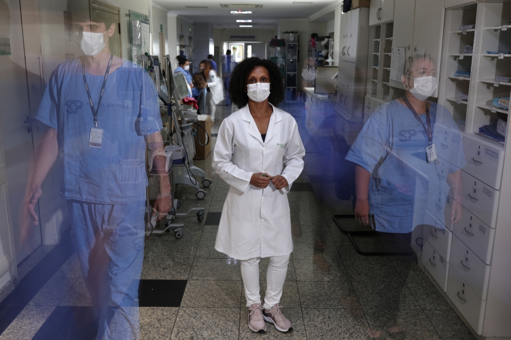 Jane Cristina Dias Alves, 43, a nurse, a volunteer in COVID-19 vaccine trial for AstraZeneca, poses for a photograph in Sao Paulo, Brazil, December 11, 2020. Alves has a daughter and lives with the parents and with the grandmother. REUTERS/Amanda Perobell