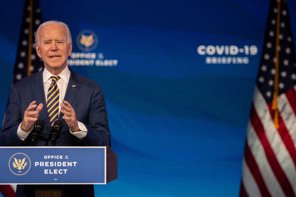 U.S. President-elect Joe Biden delivers remarks on the ongoing coronavirus (COVID-19) pandemic at the Queen Theater on December 29, 2020 in Wilmington, Delaware. Biden will be inaugurated as the 46th president in a scaled-down ceremony due to the pandemic
