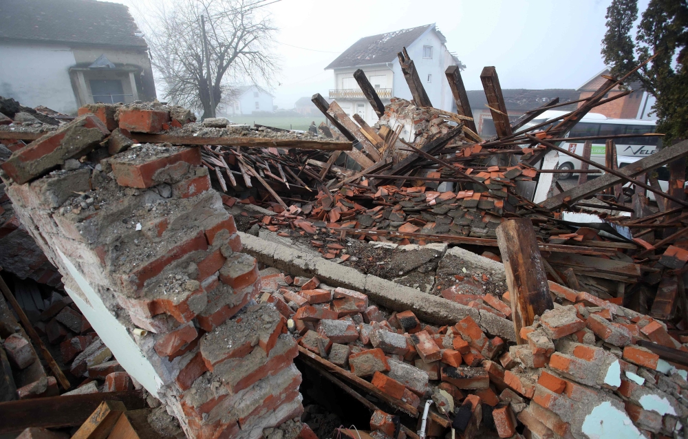 Picture taken on December 30, 2020 shows the rubble of a destroyed building in the village of Majske Poljane, where 5 people died, some 50kms from Zagreb, a day after the region was hit by a 6.4-magnitude quake. AFP / Damir Sencar 