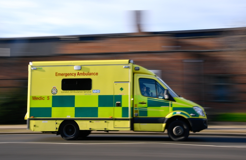 An ambulance is seen driving following the coronavirus disease (COVID-19) outbreak in London, Britain, January 2, 2021. REUTERS/Toby Melville