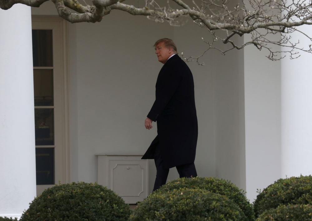 US President Donald Trump walks to the Oval Office after returning from Mar-A-Lago to the White House in Washington, December 31, 2020. (REUTERS/Leah Millis)