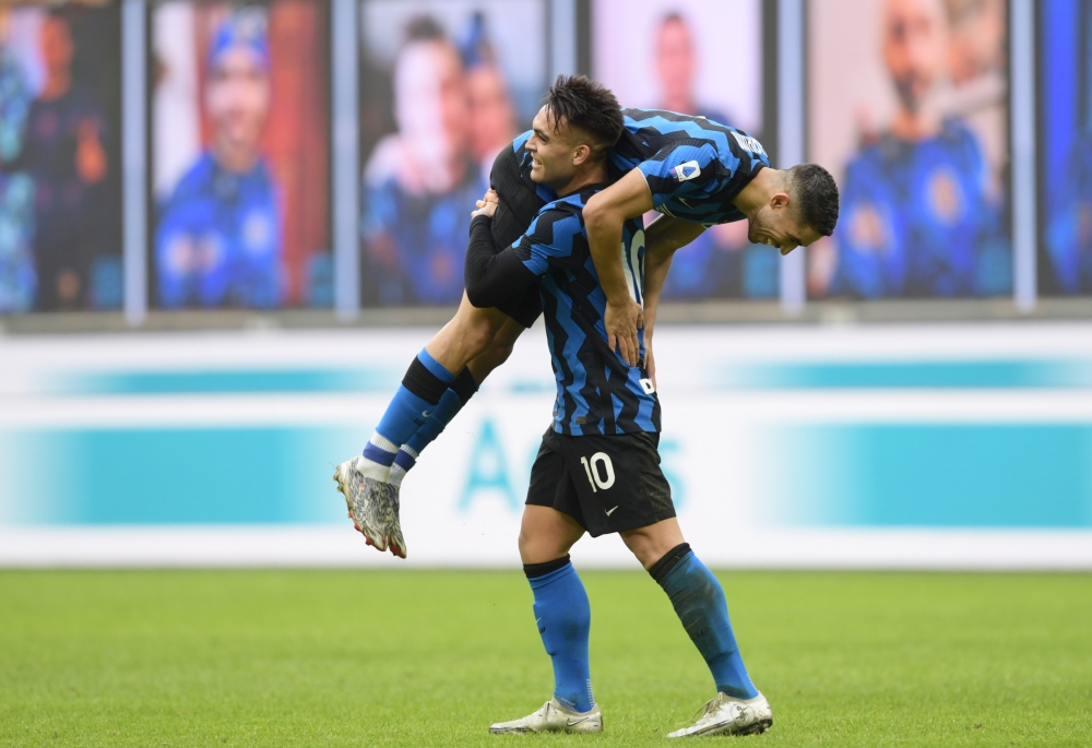  Inter Milan's Achraf Hakimi celebrates scoring their sixth goal with Lautaro Martinez REUTERS/Jennifer Lorenzini