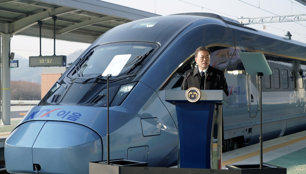 South Korean President Moon Jae-in delivers a speech during an opening ceremony for KTX-Eum train at Wonju station in Wonju, South Korea, January 4, 2021. Yonhap via REUTERS