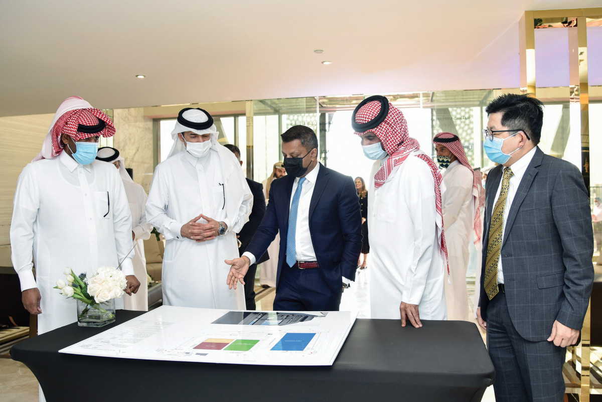 Minister of State and Chairman of QFZA, H E Ahmad bin Mohammed Al Sayed, and other officials during the event. 