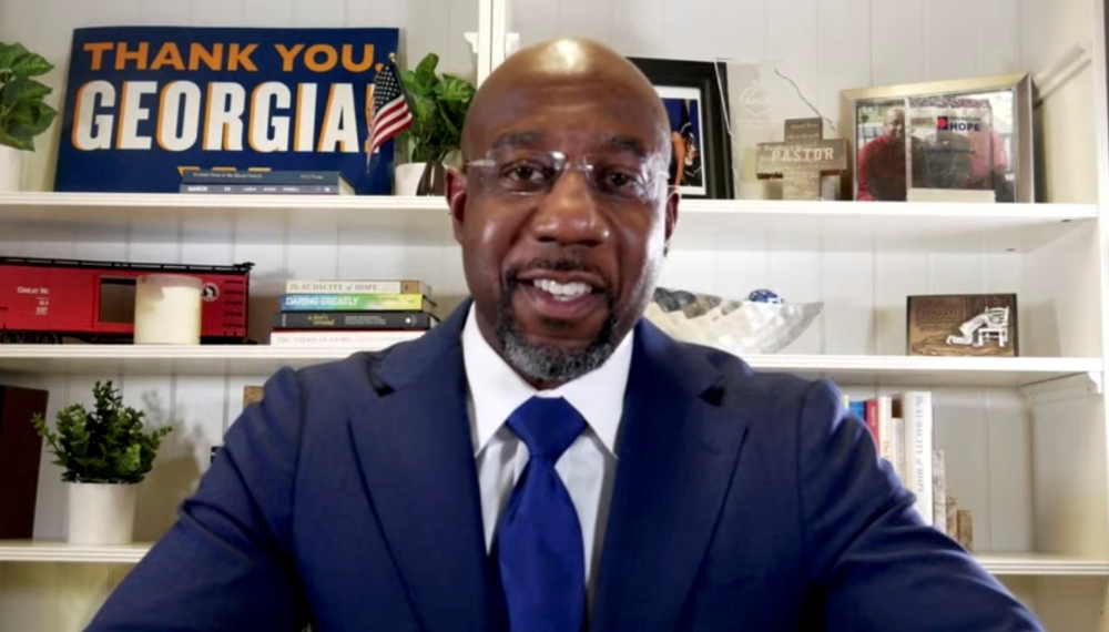 Democratic US Senate candidate Raphael Warnock speaks on his campaign's Youtube account after the runoff election against Republican Senator Kelly Loeffler in Atlanta, Georgia, US January 6, 2021. Warnock for Georgia/Social Media via Reuters