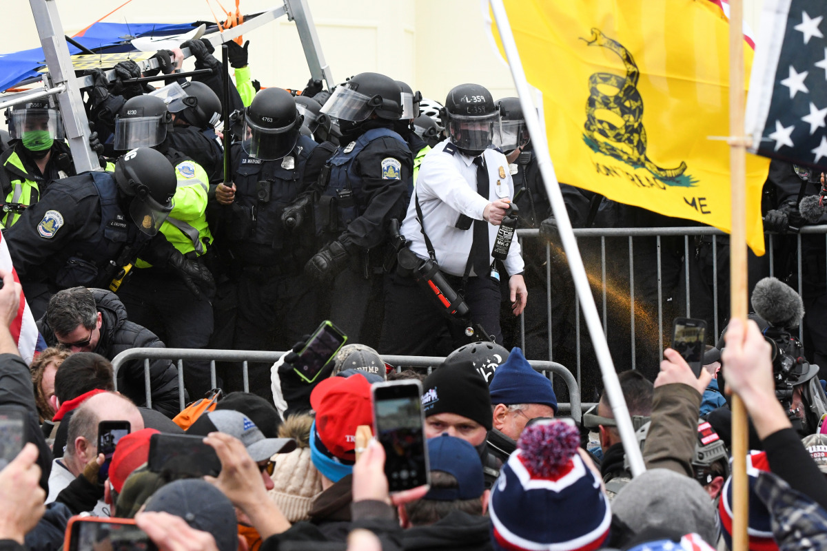Supporters of U.S. President Donald Trump clash with police officers outside of the U.S. Capitol Building in Washington, U.S. January 6, 2021. REUTERS/Stephanie Keith
