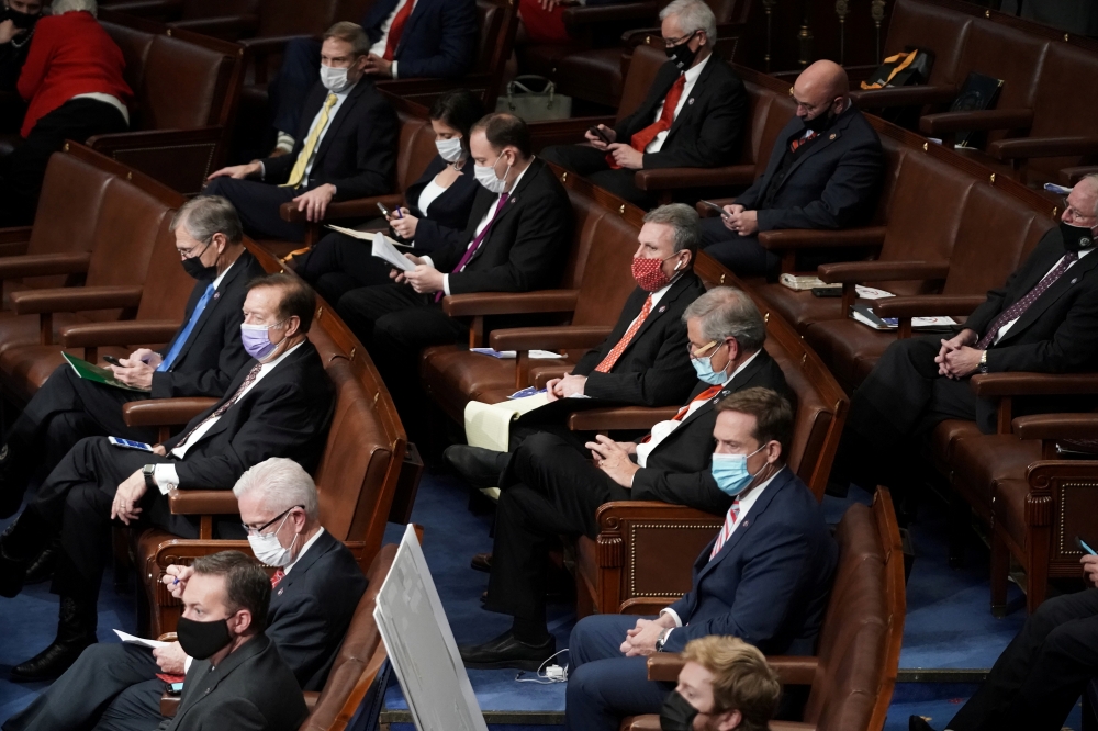 House Republicans attend a reconvened joint session of Congress to certify the Electoral College votes of the 2020 presidential election in the House chamber in Washington, U.S., January 6, 2021. Greg Nash/Pool via Reuters