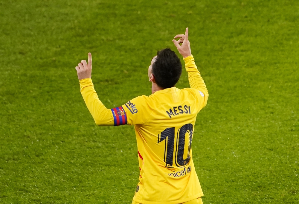 January 6, 2021 Barcelona's Lionel Messi celebrates scoring their third goal REUTERS/Vincent West
