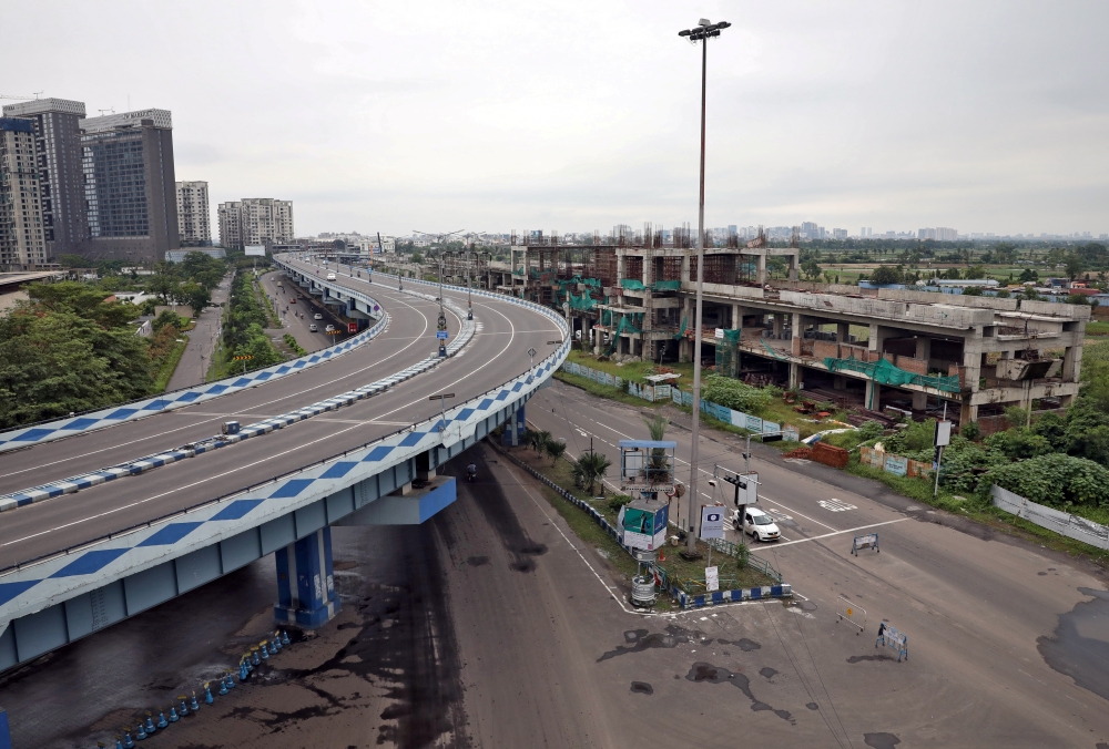 FILE PHOTO: A view of almost empty roads is seen after authorities announced lockdown for two days every week in the West Bengal state, amidst the spread of the coronavirus disease (COVID-19), in Kolkata, India, July 23, 2020. REUTERS/Rupak De Chowdhuri