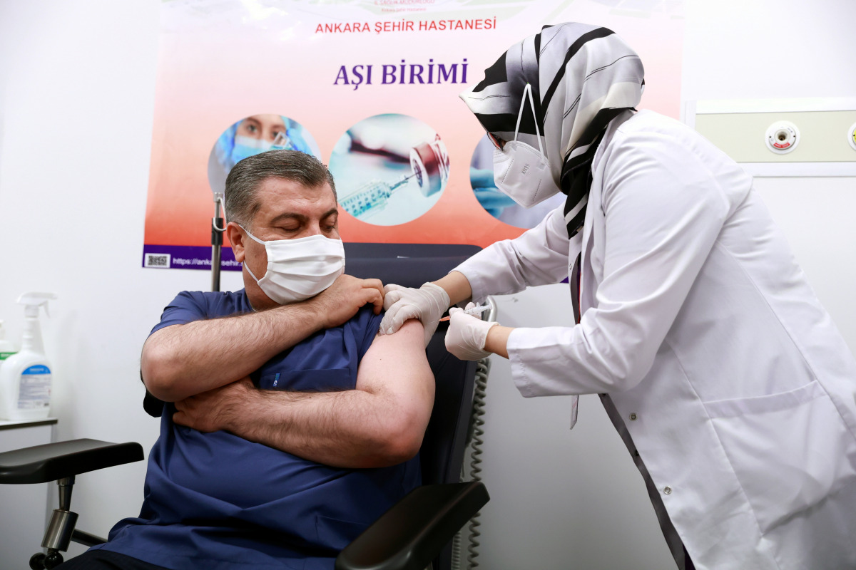 Turkish Health Minister Fahrettin Koca receives a shot of the Sinovac's CoronaVac coronavirus disease (COVID-19) vaccine at Ankara City Hospital?in Ankara, Turkey, January 13, 2021. Turkish Health Ministry/Handout via REUTERS
