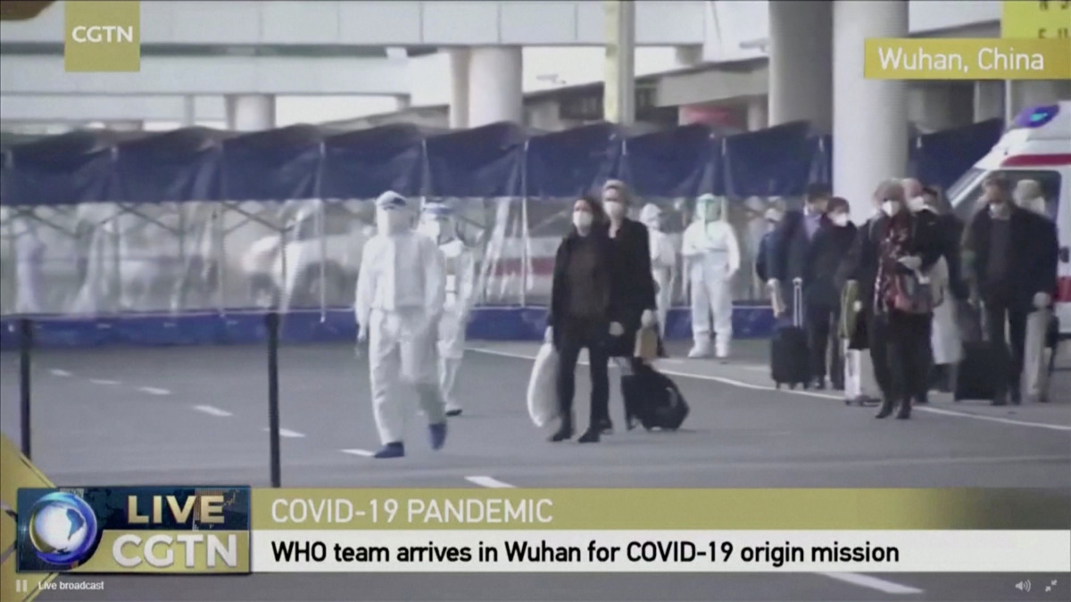 Members of the World Health Organisation (WHO) team tasked with investigating the origins of the coronavirus disease (COVID-19) pandemic arrive at Wuhan Tianhe International Airport in Wuhan, Hubei province, China, January 14, 2021, in this still image ta