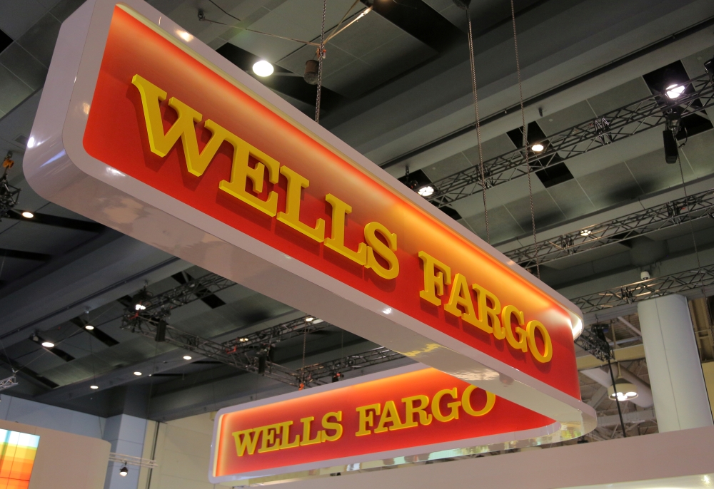 A Wells Fargo logo is seen at the SIBOS banking and financial conference in Toronto, Ontario, Canada October 19, 2017. Picture taken October 19, 2017. REUTERS/Chris Helgren/File Photo