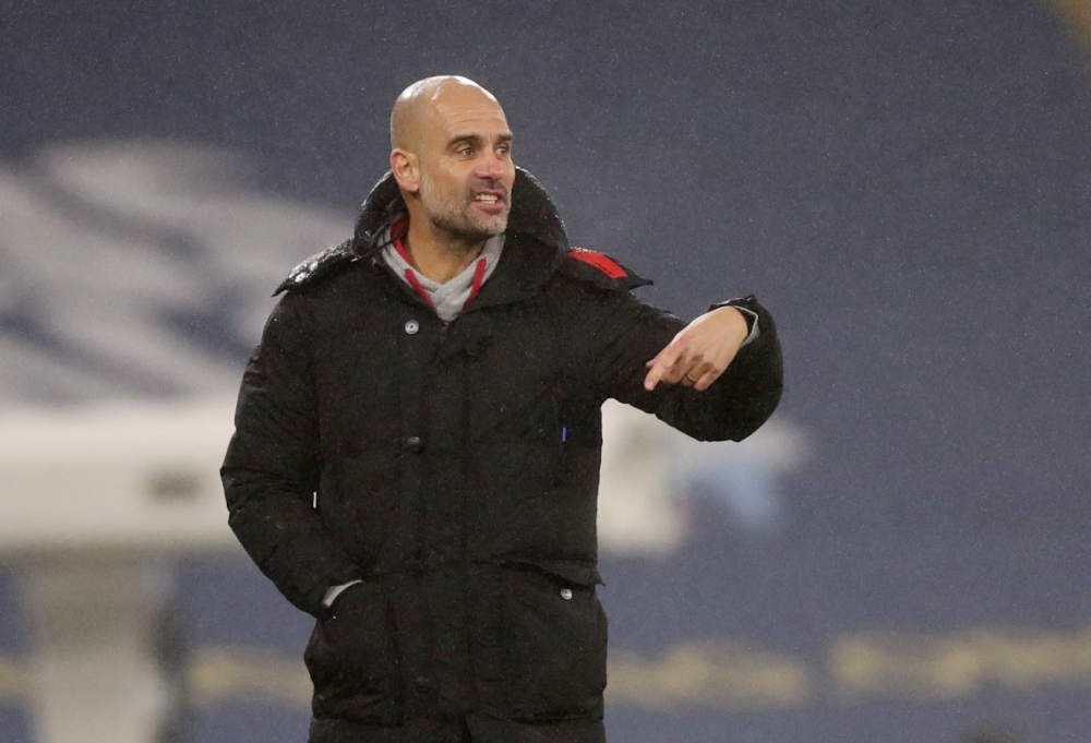 January 13, 2021 Manchester City manager Pep Guardiola during the match Pool via REUTERS/Clive Brunskill