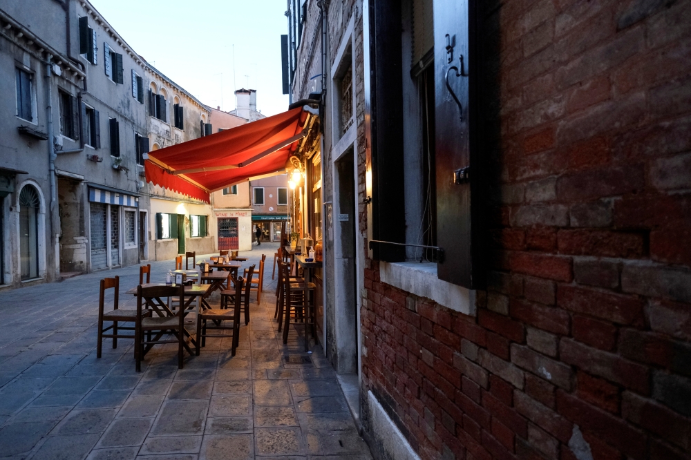 A restaurant frustrated with being shut by the government due to coronavirus disease (COVID-19) restrictions defies the rules and opens to the public as part of a nationwide protest against the ongoing curbs, in Venice, Italy, January 15, 2021. REUTERS/Ma