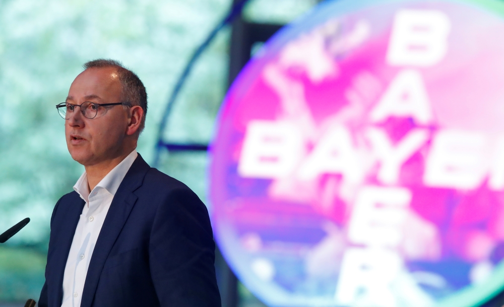 Werner Baumann, CEO of Bayer AG, addresses the German drugmaker's annual results news conference in Leverkusen, Germany, February 27, 2020. REUTERS/Wolfgang Rattay/File Photo