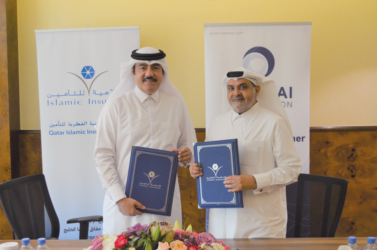 Officials of QIIG and SAP during agreement signing ceremony.