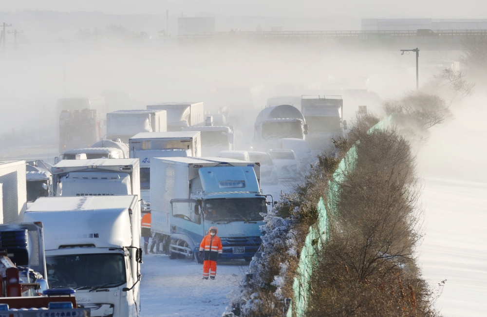 General view shows the site where cars were involved in a series of crashes when a snow storm struck a stretch of highway on the Tohoku Expressway in Osaki, Miyagi prefecture, northern Japan January 19, 2021. Kyodo via REUTERS