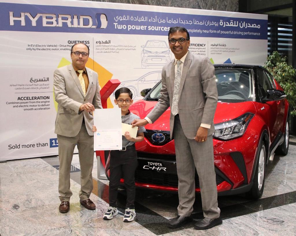 Sohan Sandeep, a winner of Toyota Dream Car Art Contest 2020, receiving a certificate from Toyota officials. 