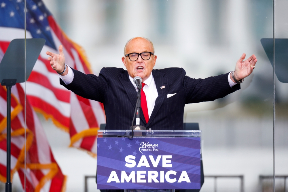 File photo of Rudy Giuliani as he speaks as Trump supporters gather by the White House ahead of his speech to contest the certification by the U.S. Congress of the results of the 2020 U.S. presidential election in Washington, U.S, January 6, 2021. Reuters