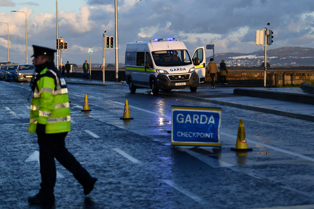 Garda (Irish Police) monitors the government-imposed 5km travel limit at a road checkpoint, amid the spread of the coronavirus disease (COVID-19), in Dublin, Ireland, January 24, 2021. Picture taken January 24, 2021. REUTERS/Clodagh Kilcoyne
