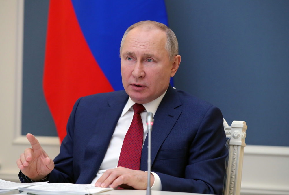 Russia's President Vladimir Putin attends a video conference during the World Economic Forum (WEF) of the Davos Agenda, in Moscow, Russia January 27, 2021. Sputnik/Mikhail Klimentyev/Kremlin via REUTERS ATTENTION EDITORS - THIS IMAGE WAS PROVIDED BY A THI