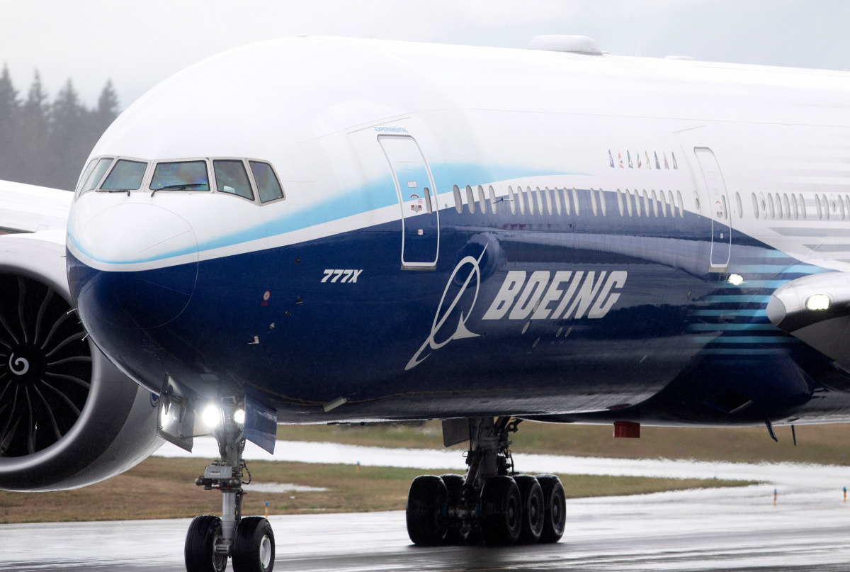 FILE PHOTO: A Boeing 777X airplane taxis during an attempted first test flight from the company's plant in Everett, Washington, U.S. January 24, 2020. REUTERS/Lindsey Wasson/File Photo
