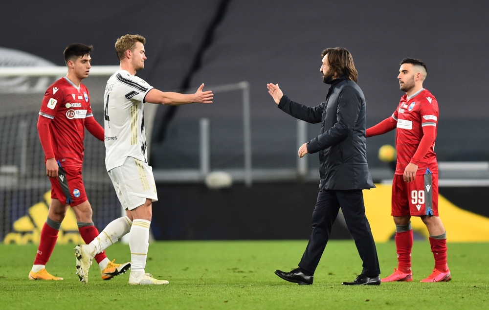 Juventus coach Andrea Pirlo with Matthijs de Ligt after the match REUTERS/Massimo Pinca