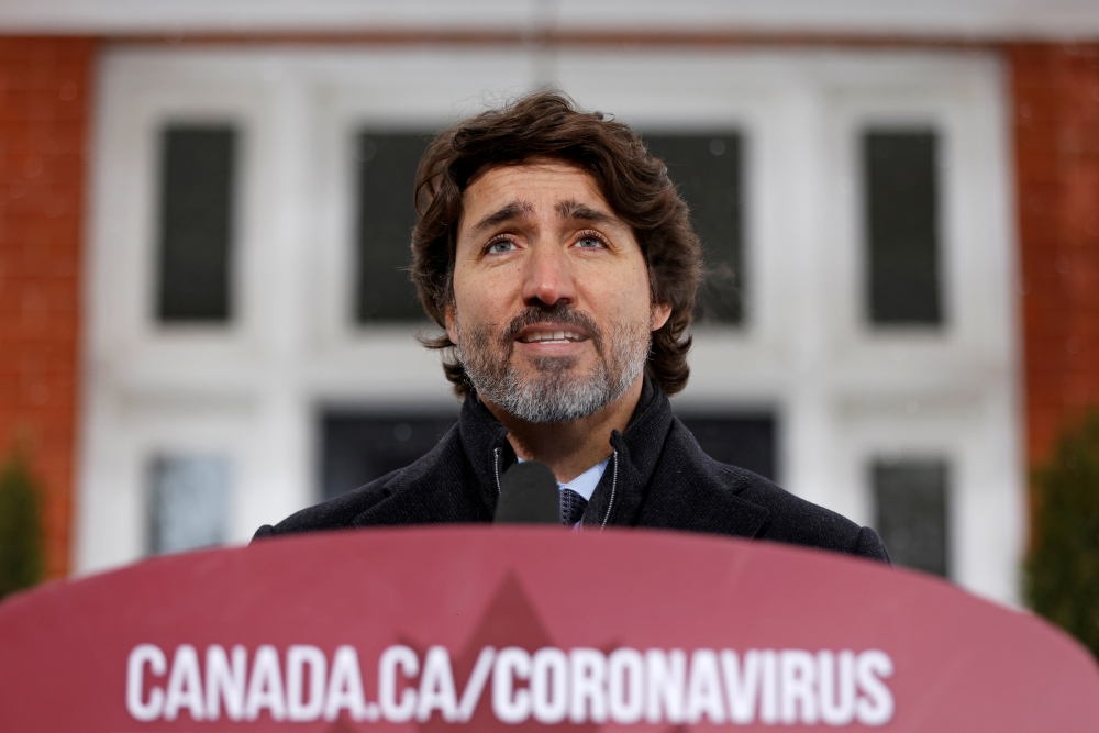 Canada's Prime Minister Justin Trudeau speaks during a news conference at Rideau Cottage, as efforts continue to help slow the spread of the coronavirus disease (COVID-19), in Ottawa, Ontario, Canada January 5, 2021. REUTERS/Blair Gable/File Photo