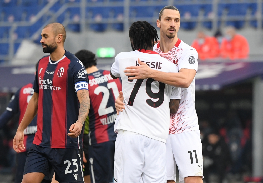 AC Milan's Franck Kessie celebrates scoring their second goal with teammate Zlatan Ibrahimovic REUTERS/Alberto Lingria
