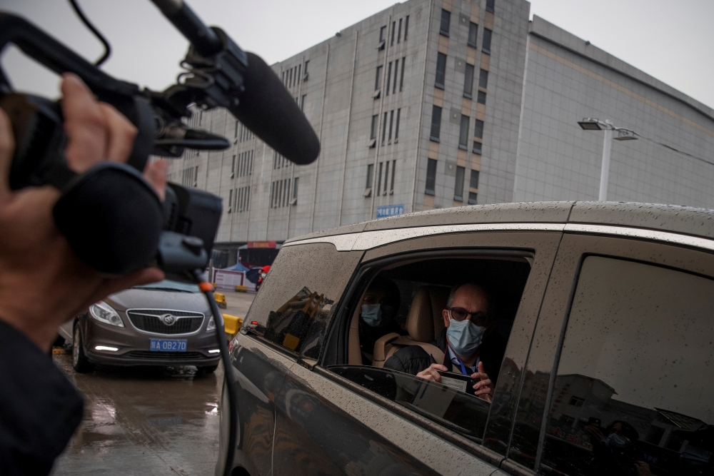 Peter Ben Embarek, a member of the World Health Organisation (WHO) team tasked with investigating the origins of the coronavirus (COVID-19) pandemic, leaves Baishazhou market in Wuhan, Hubei province, China, January 31, 2021. Reuters/Thomas Peter