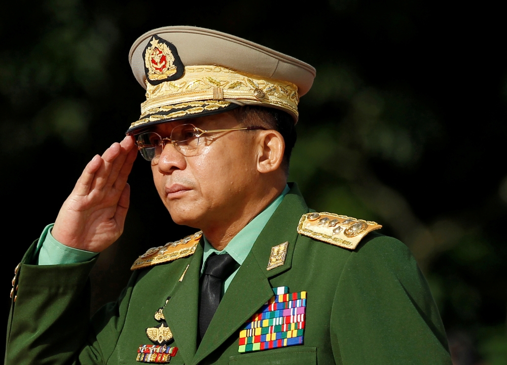 File photo: Myanmar Commander in Chief Senior General Min Aung Hlaing salutes as he attends an event marking the anniversary of Martyrs' Day at the Martyrs' Mausoleum in Yangon July 19, 2016. Reuters/Soe Zeya Tun/File Photo