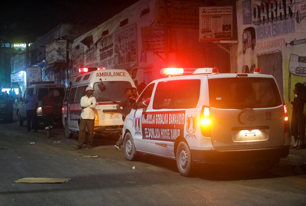Ambulances are seen near the scene of a car bomb explosion in the Kilometre 4 area of Mogadishu, Somalia January 31, 2021. REUTERS/Feisal Omar