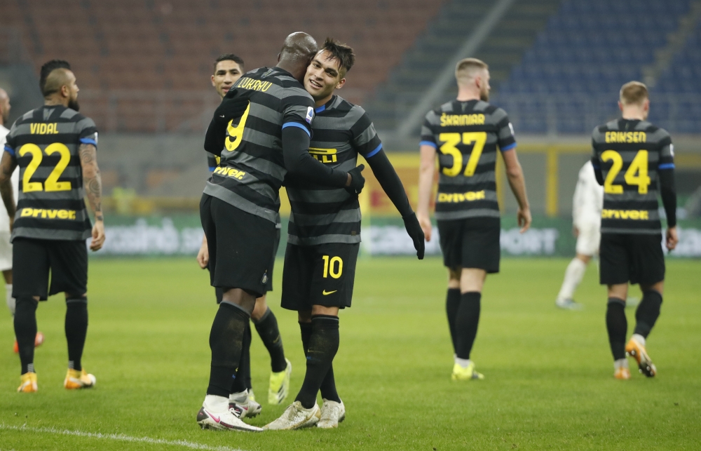 Inter Milan's Romelu Lukaku celebrates scoring their third goal with Lautaro Martinez REUTERS/Alessandro Garofalo