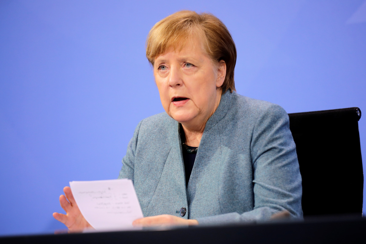 German Chancellor Angela Merkel holds a news conference after meeting with vaccine producers and Germany's state prime ministers for a 