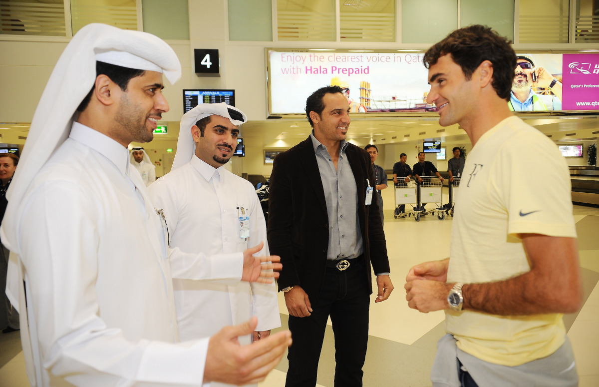 Qatar Tennis Federation President Nasser bin Ghanim Al Khelaifi welcoming Swiss tennis star Roger Federer ahead of the Qatar ExxonMobil Open in this January 2, 2011 file photo. 