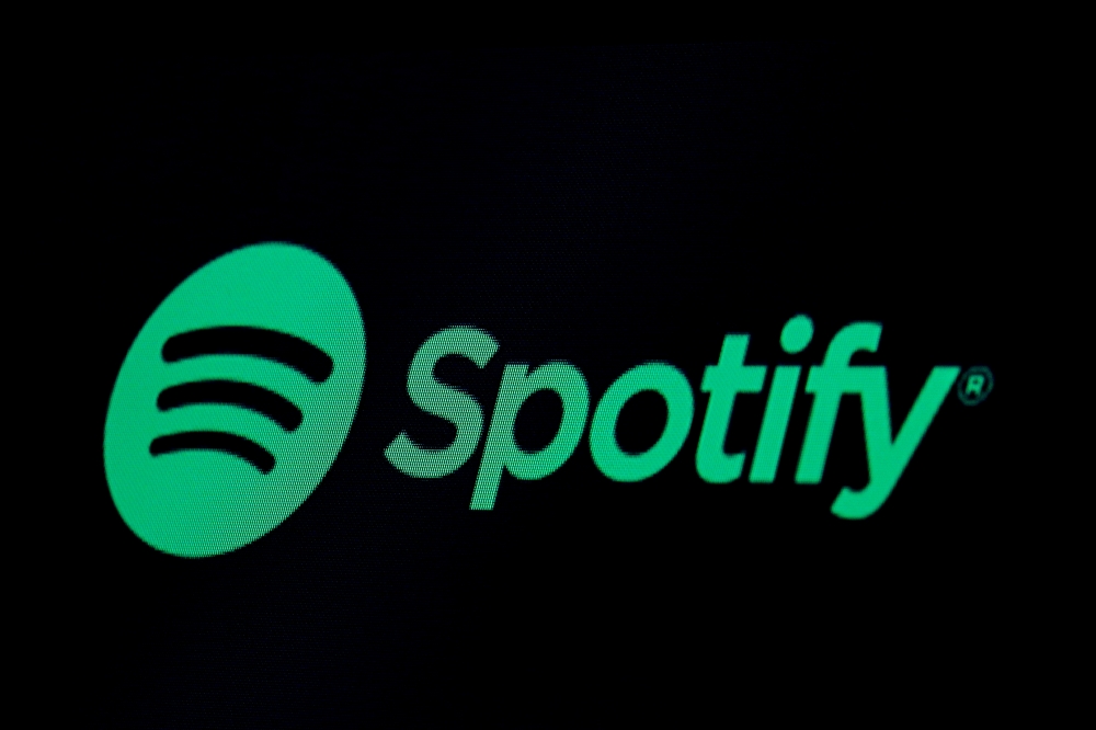 The Spotify logo is displayed on a screen on the floor of the New York Stock Exchange (NYSE) in New York, U.S., May 3, 2018. REUTERS/Brendan McDermid/File Photo