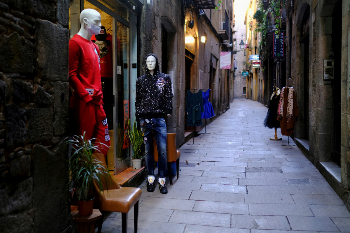 FILE PHOTO: Mannequins are seen on an empty street in Barrio Gotico (Gothic Quarter), after Catalonia's government imposed new restrictions in an effort to control the spread of the coronavirus disease (COVID-19), in Barcelona, Spain January 26, 2021. REU