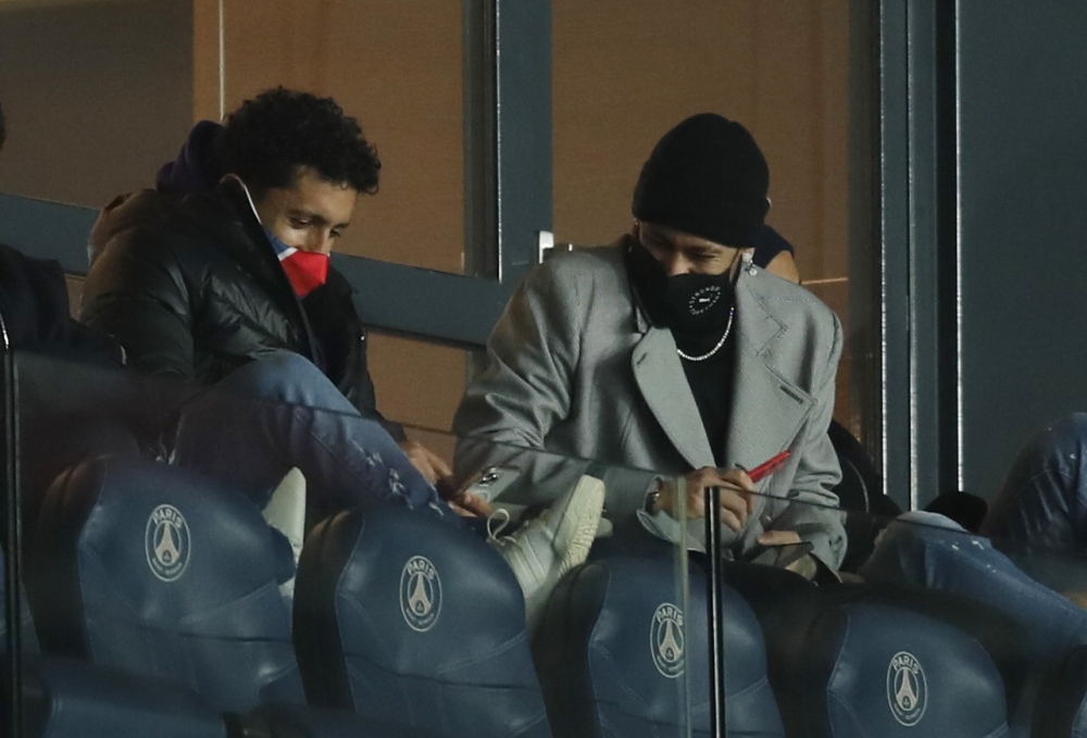Paris St Germain's Neymar and Marquinhos in the stands during the match REUTERS/Gonzalo Fuentes